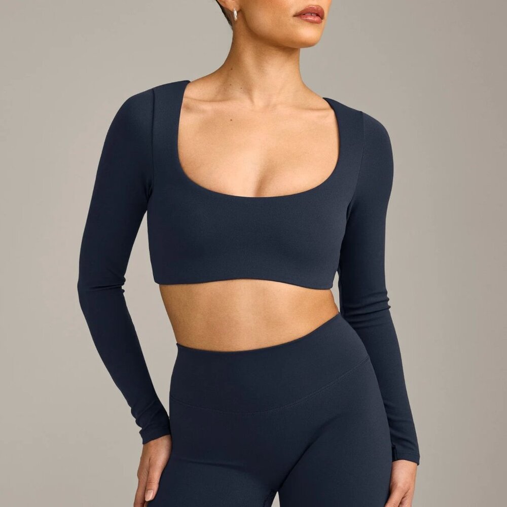 NWOT SoftMotion™ Scoop Neck Long Sleeve Crop Top with Built in Bra Shelf